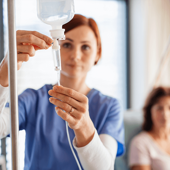 Person preparing IV sedation in Carrollton