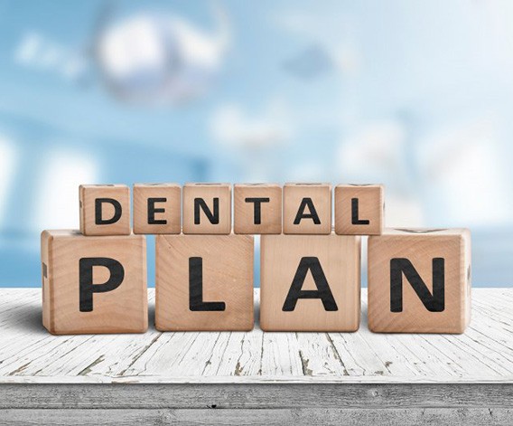 Blocks spell “dental plan”